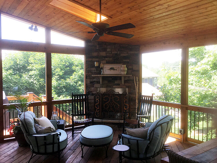 Custom screened porch with outdoor fireplace