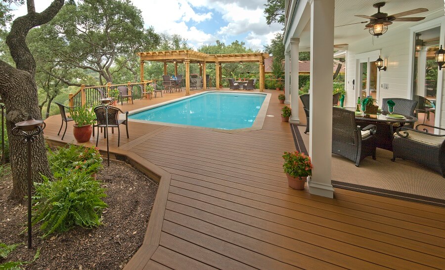 deck around pool with pergola