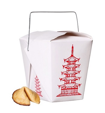 Chinese takeout box with a fortune cookie next to it