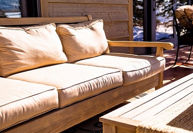 close up of an outdoor couch and table