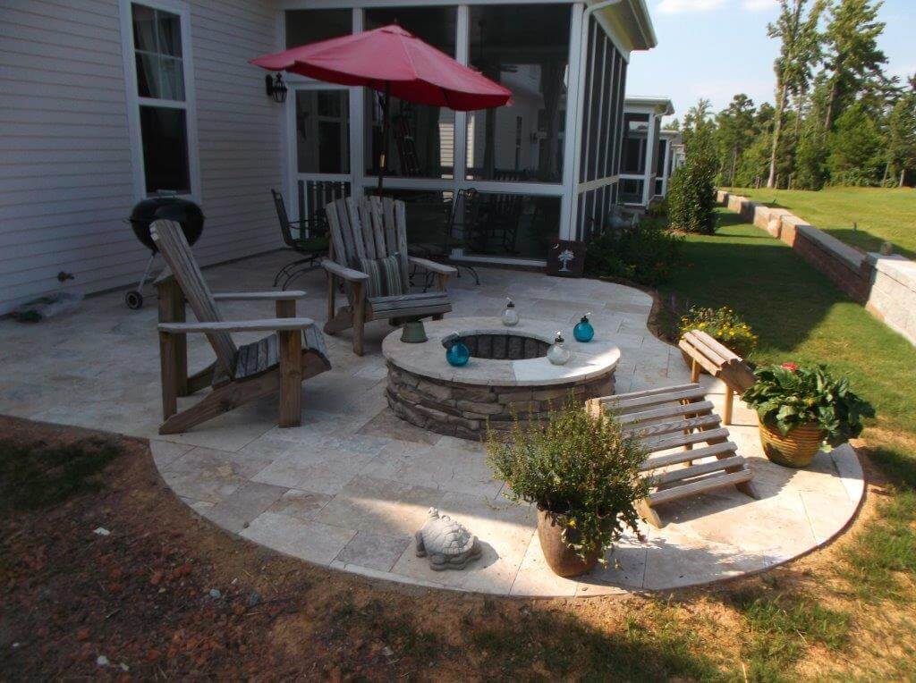 round fire pit on curved patio
