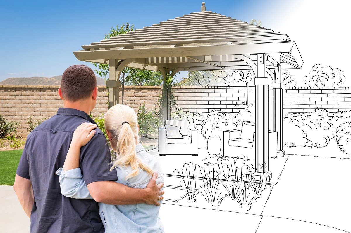 couple looking at outdoor living space designs