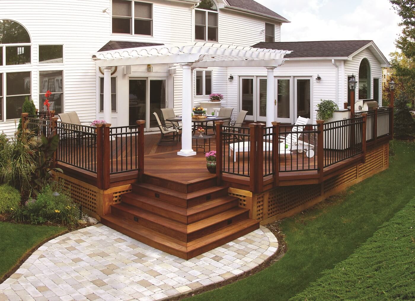 Wooden-freestanding-deck-with-pergola-and-paver-patio-below