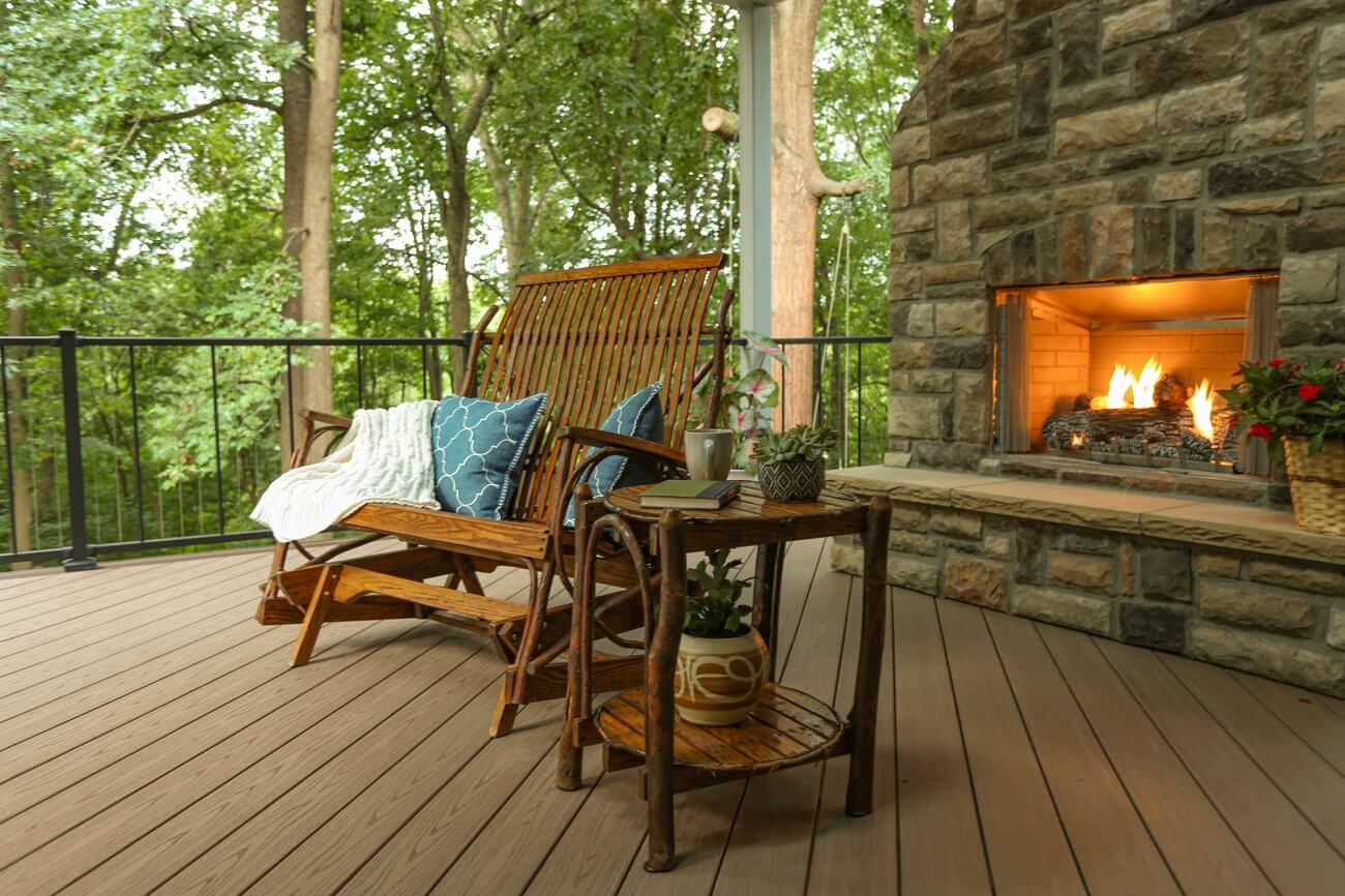 custom deck with fireplace