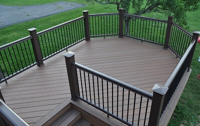 Custom backyard deck with railing