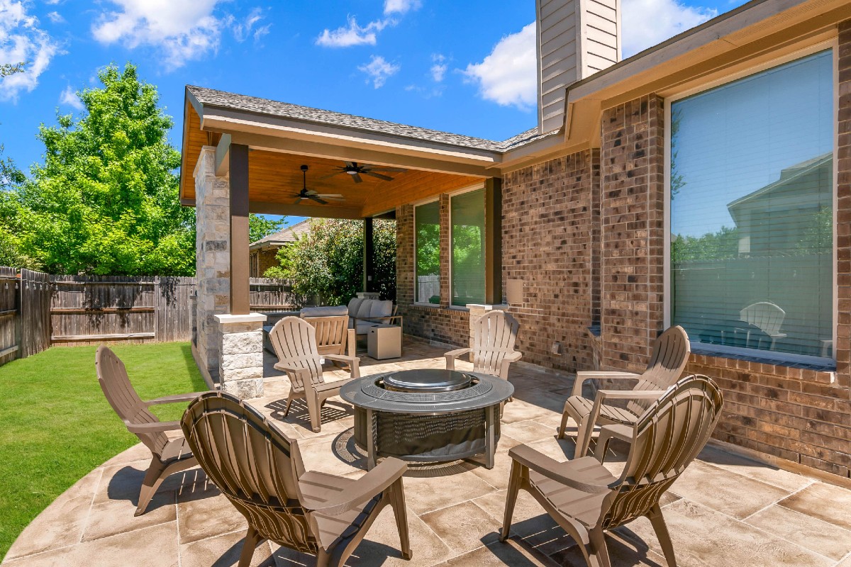 Custom covered patio and open patio with firepit