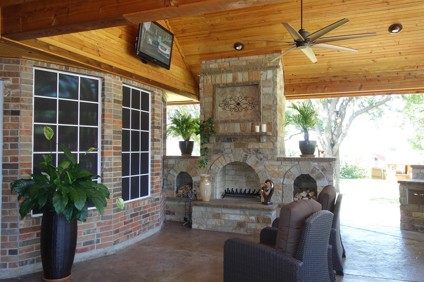 Outdoor patio area with a fireplace
