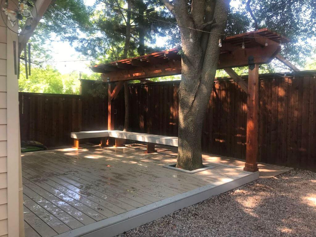 Custom deck with pergola and floating bench
