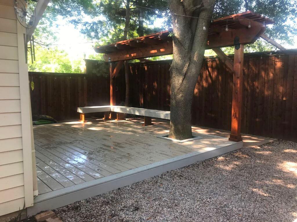 Custom deck with pergola and floating bench