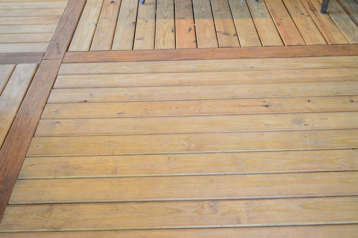 We-used-KDAT-wooden-decking-for-the-porch-floor-installed-using-a-patchwork-design
