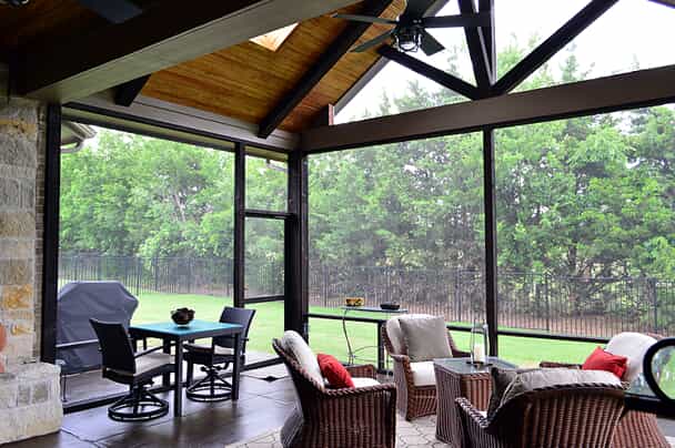 screened porch with seating