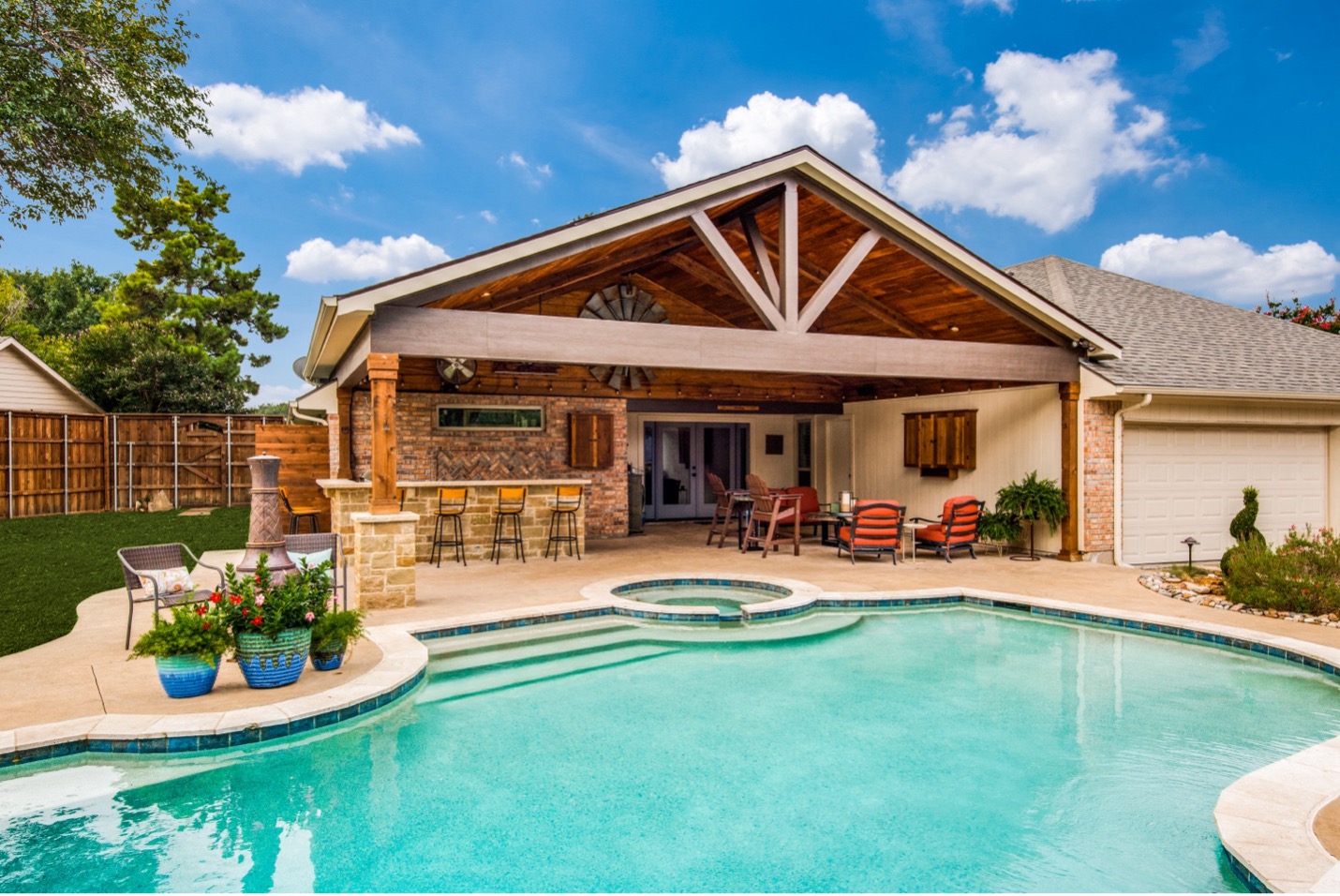poolside covered patio with gable roof