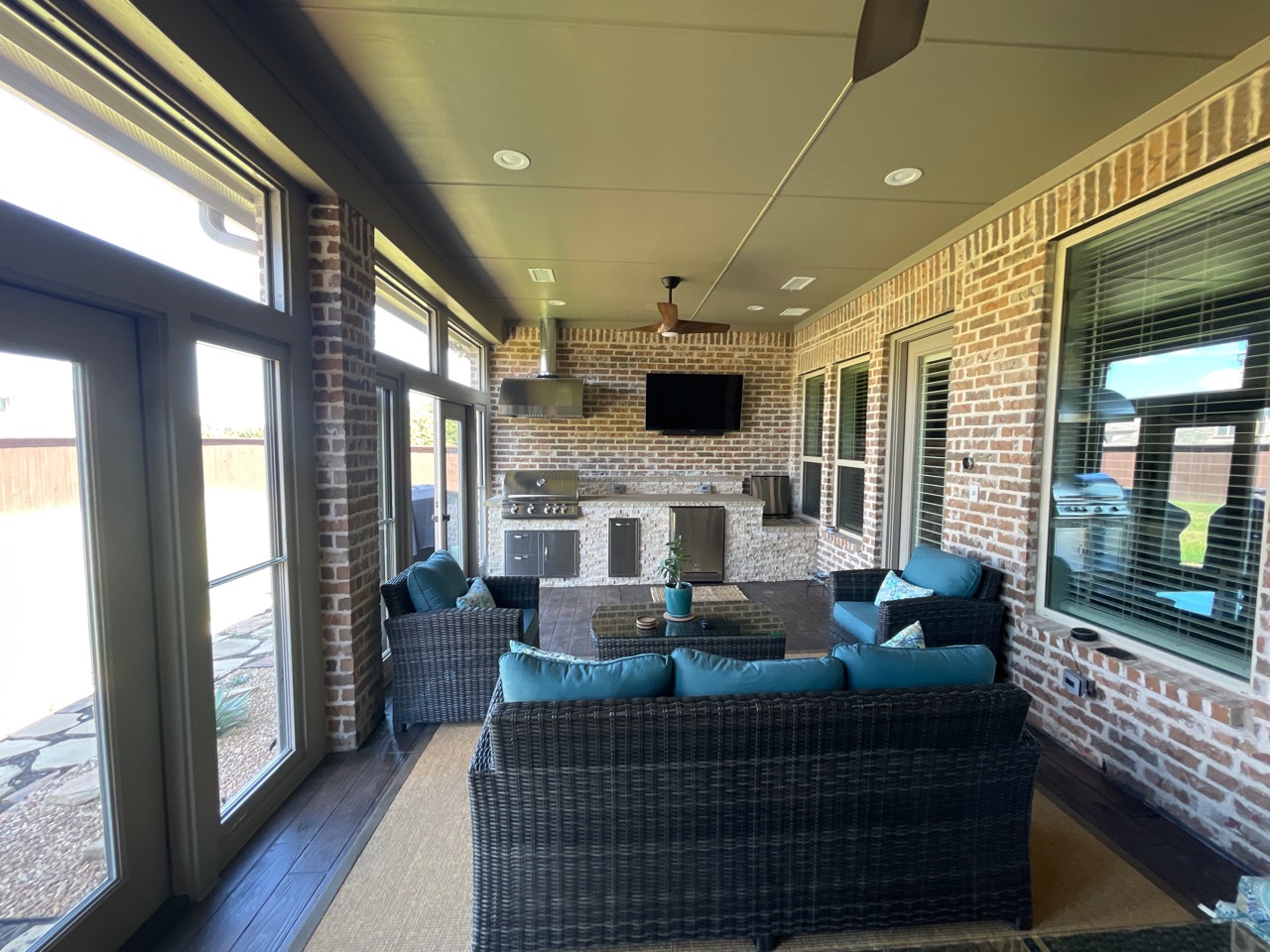 interior of Arglye TX covered patio with outdoor kitchen