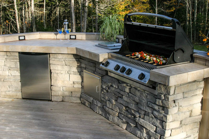 Grill top for outlet outdoor kitchen