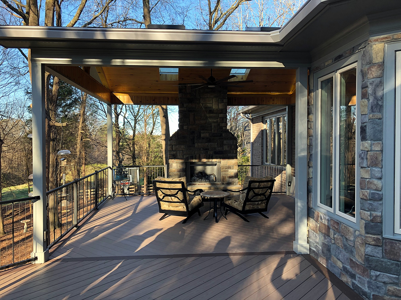 deck and porch with fireplace