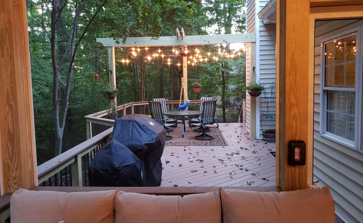 backyard deck with string lighting in greensboro 