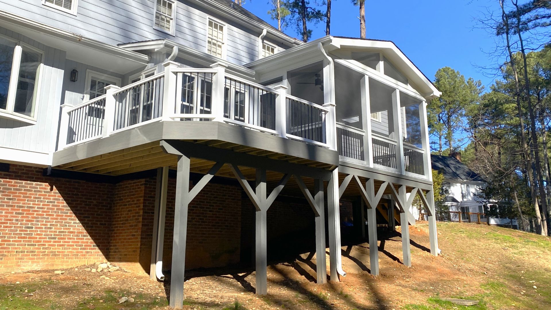 A house with a deck
AI-generated content may be incorrect.