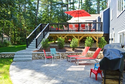 deck and patio with landscaping