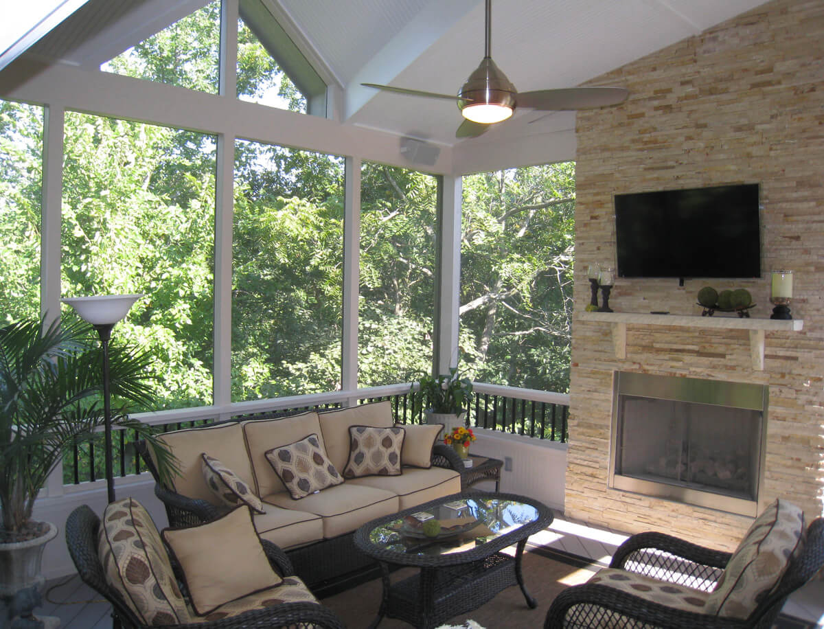 Raleigh screened porch with fireplace and railings