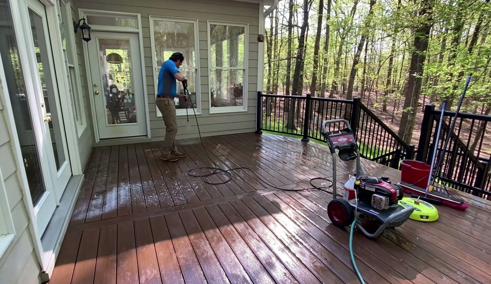 Kyle Faulkner of Archadeck of Raleigh-Durham Cleaning patio
