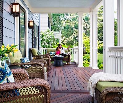 Outdoor porch with wicker furniture.