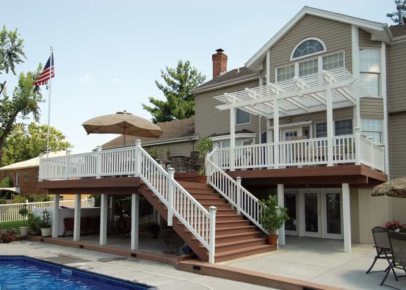 Large pool-side deck with attached pergola