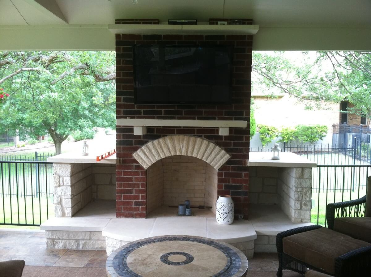 Outdoor fireplace and covered patio