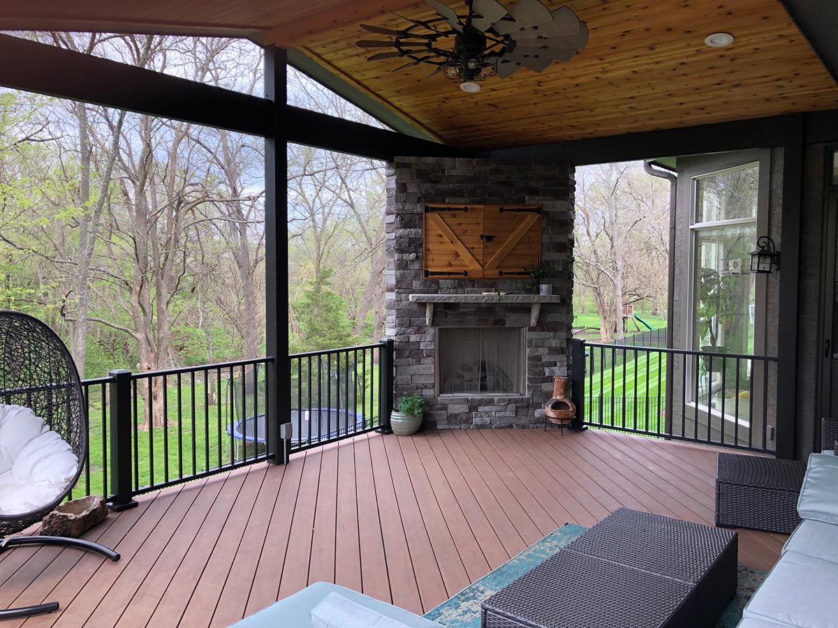 Custom deck and patio with outdoor fireplace