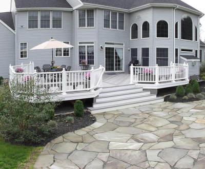 Deck with railing and paver patio