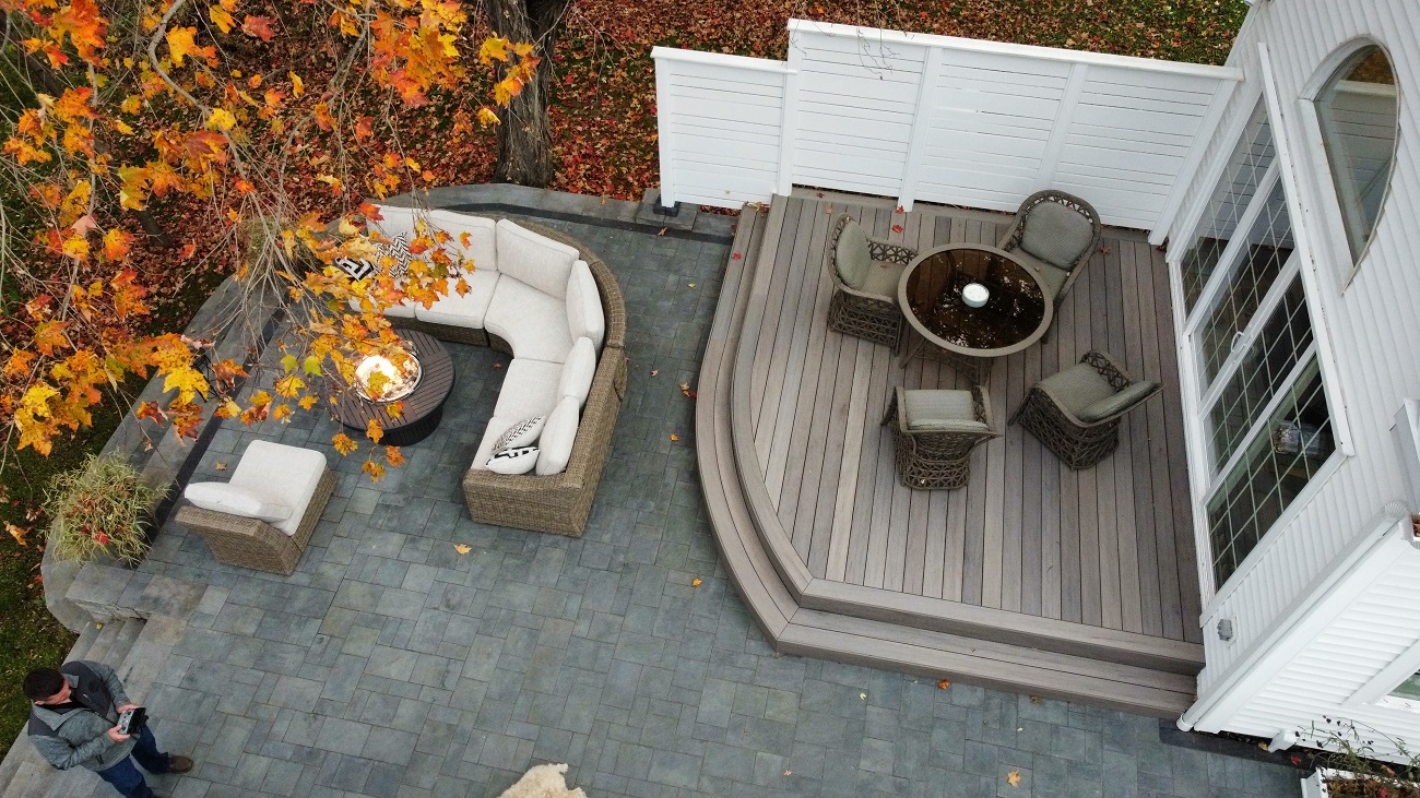 patio and deck with an outdoor living space