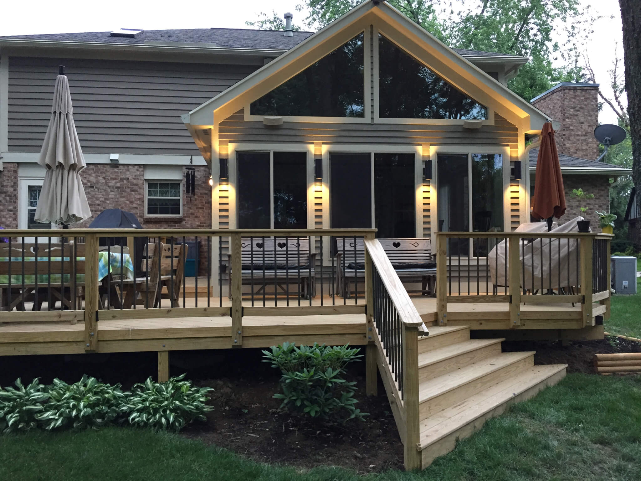 wood deck with railings and stairs