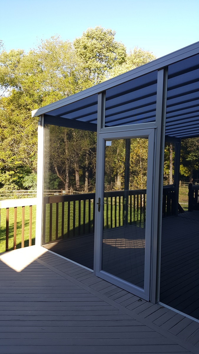 Natural Light patio cover with screen opens to uncovered deck