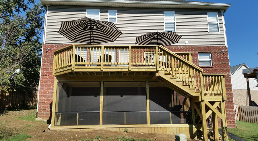 Second story deck with umbrellas and stairs