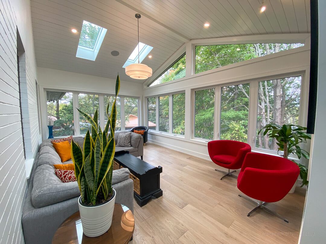 sunroom with furniture and plant