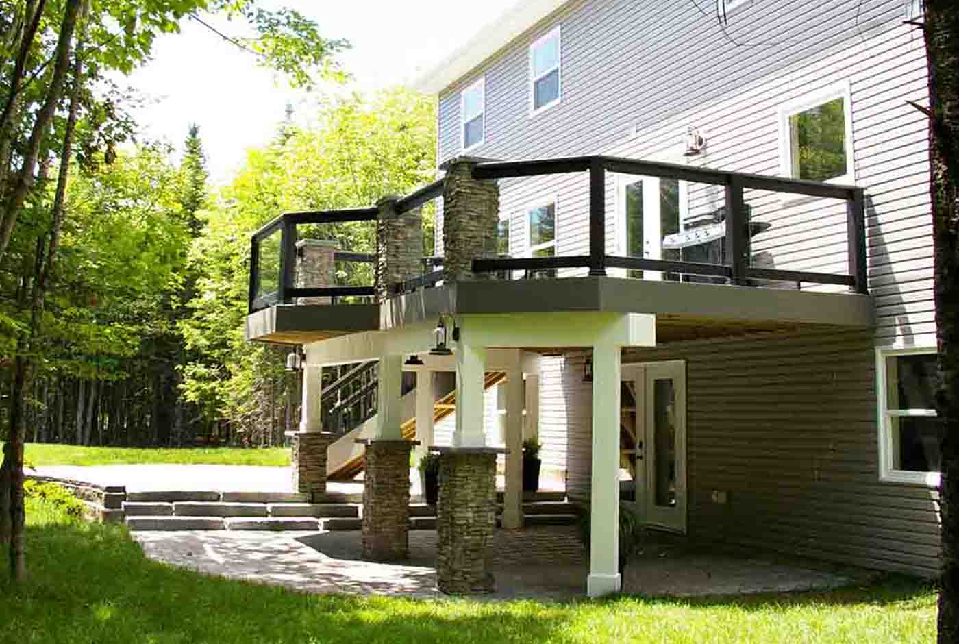 Stone patio with second level deck