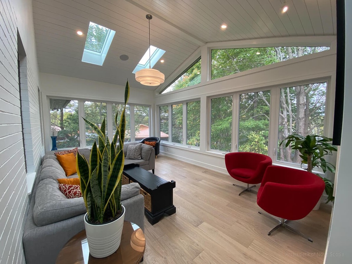 Sunroom with plants and furniture
