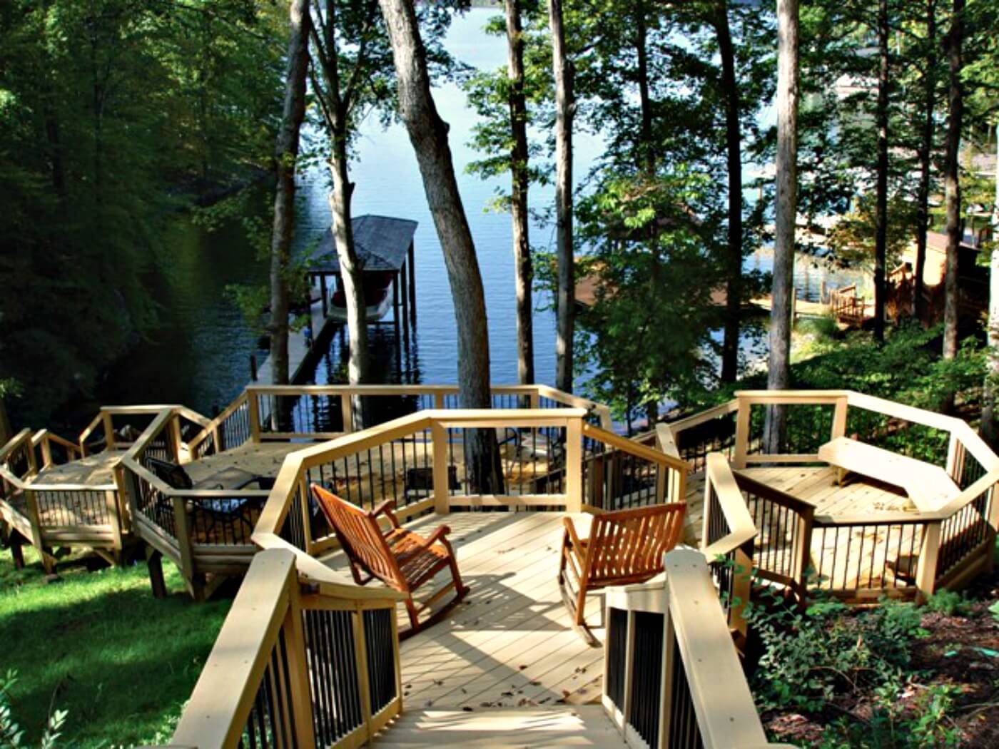 Custom multi-level lakeside deck with stairs and dock