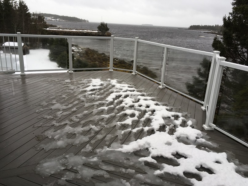 Halifax composite deck with ocean view, incorporates aluminum railings