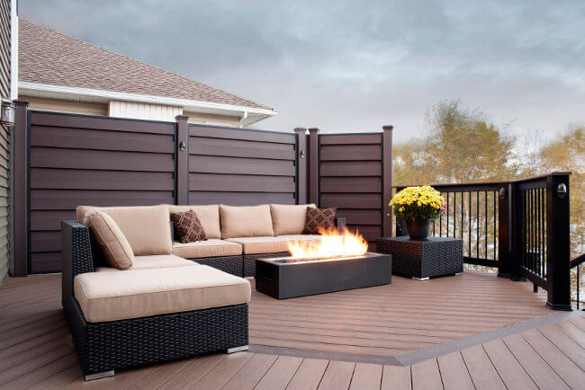 Custom deck with privacy wall and fire pit