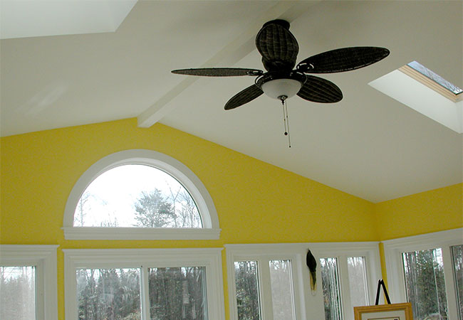 Ceiling fan and skylight in sunroom addition