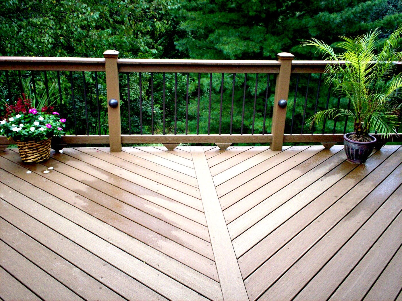 low maintenance composite deck with iron railing
