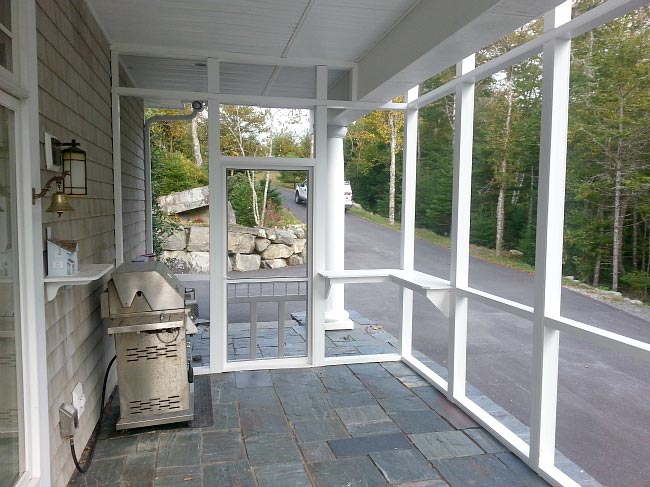 Screened porch with stone patio