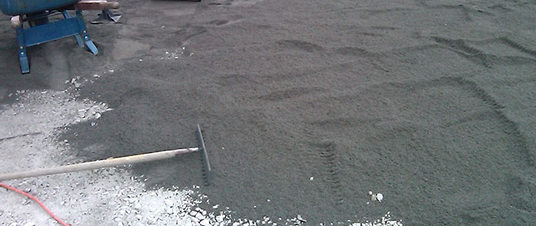 Sand underlayment for stone pavers