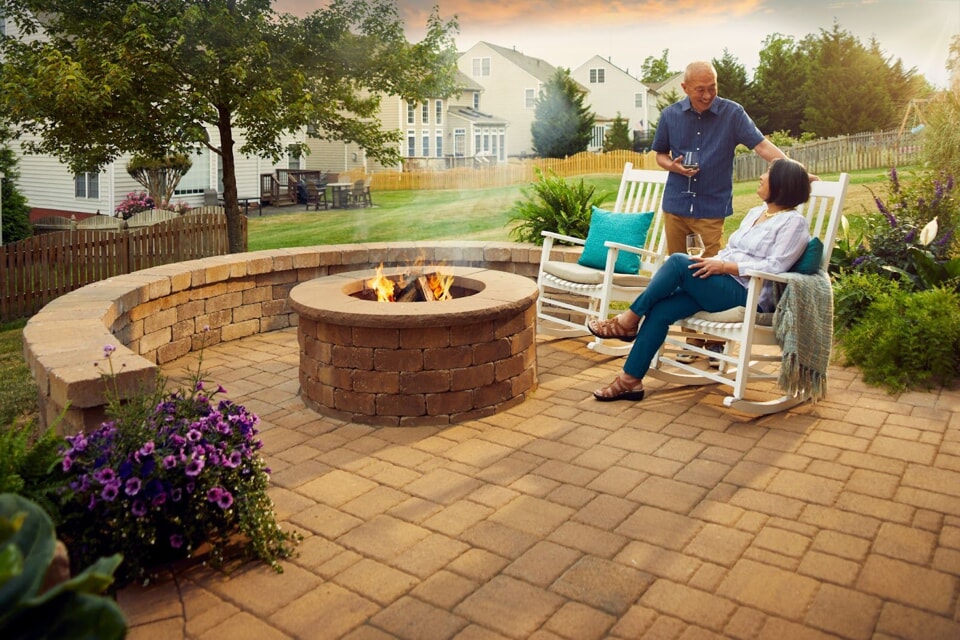 couple enjoying fire pit outside