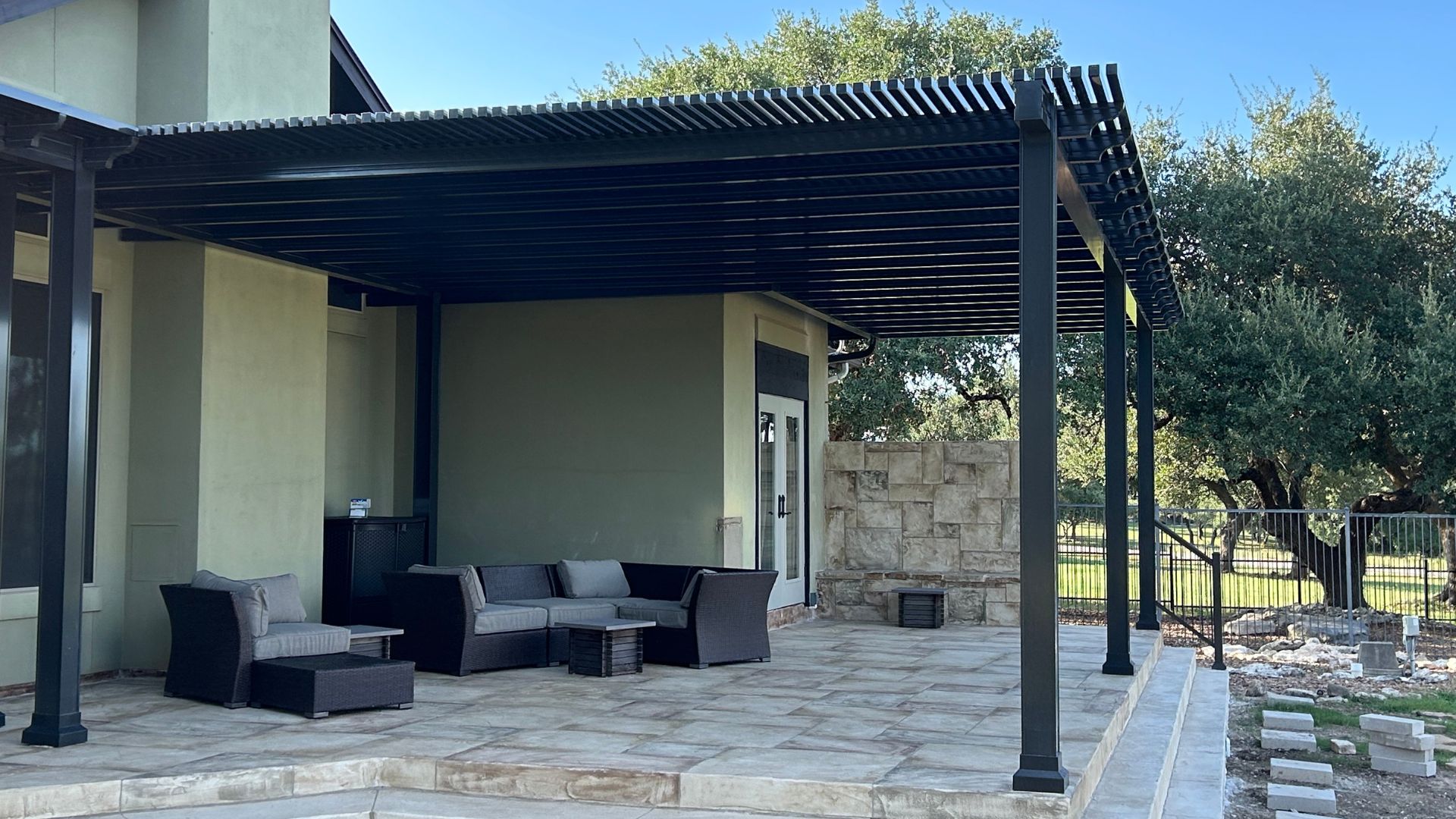 patio with overhead pergola in spring branch