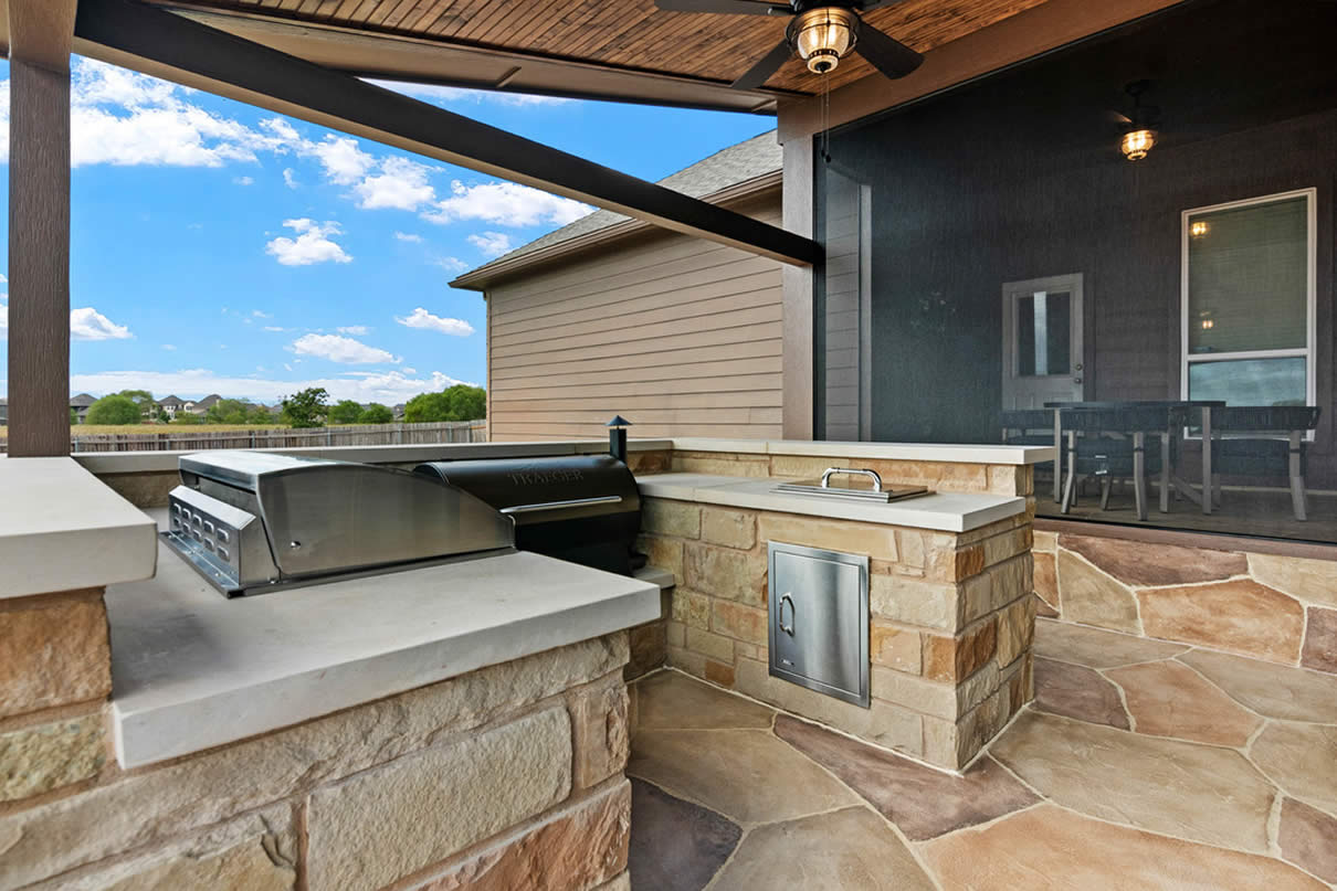 outdoor kitchen Hill Country screened in patio