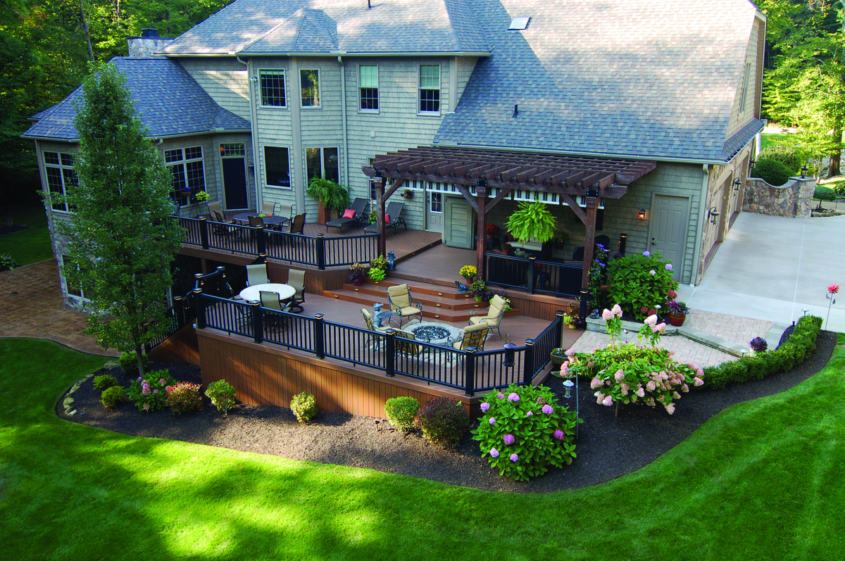Multilevel wood deck in backyard