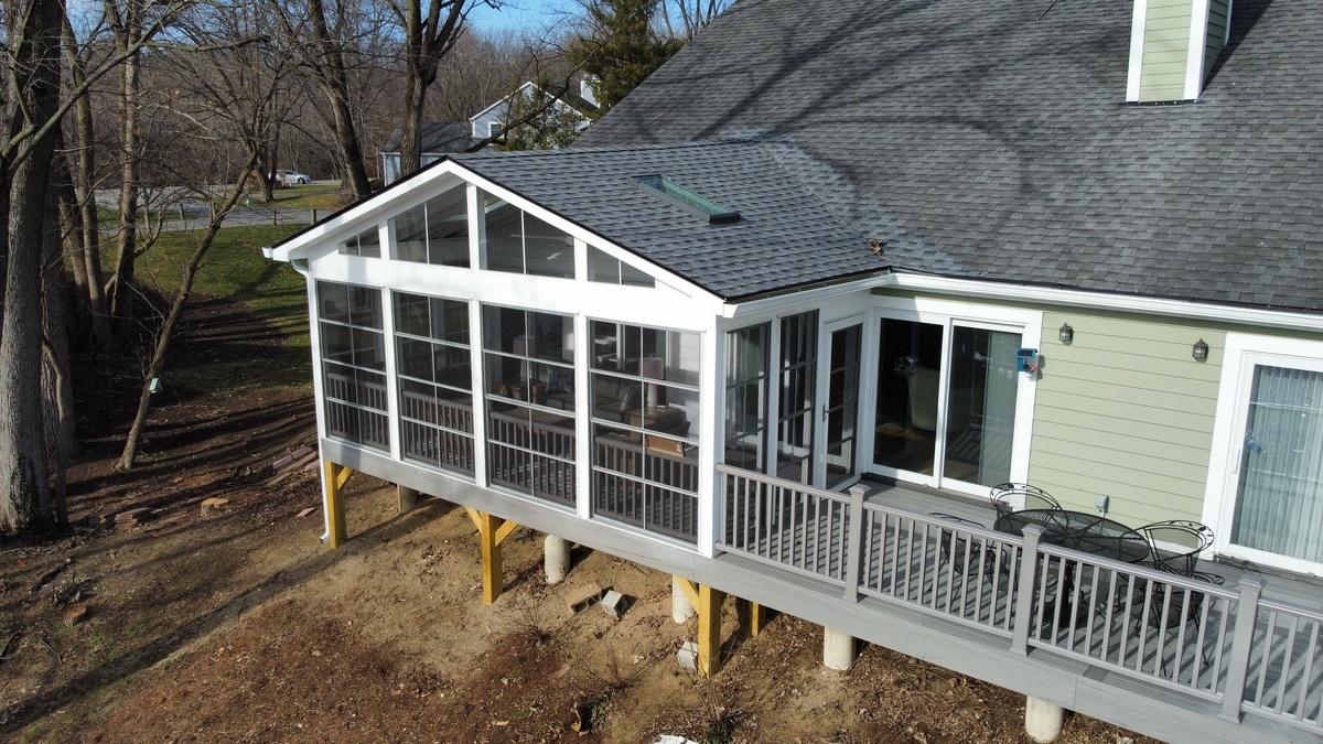 home with covered patio and open deck